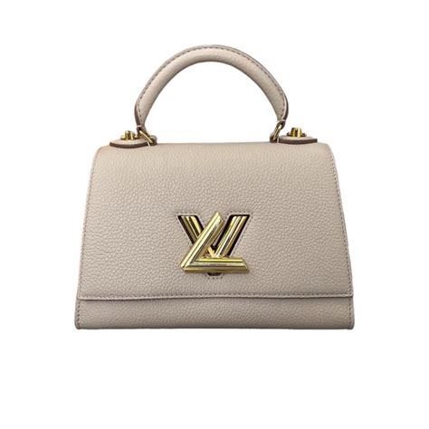 louis vuitton twist one handle mm greige taurillon|Twist One Handle PM Taurillon Leather .